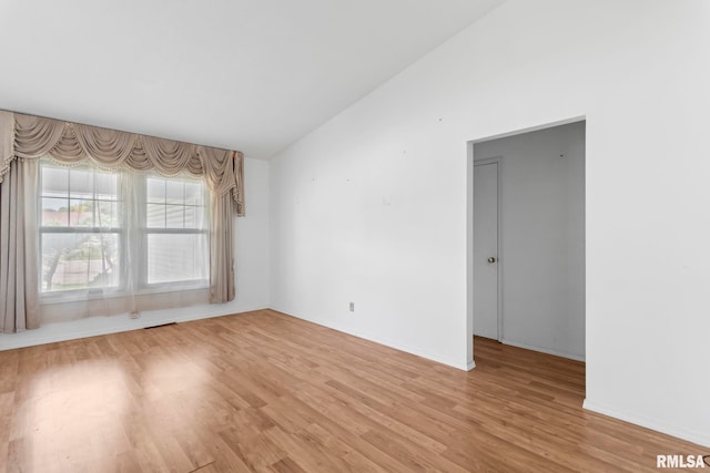 2924 Flowerbrook Ct, Springfield, IL 62702 - unfurnished room with light wood finished floors and lofted ceiling