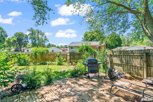 2924 Flowerbrook Ct, Springfield, IL 62702 - wooden deck with a grill and a fenced backyard