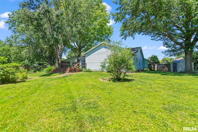 2924 Flowerbrook Ct, Springfield, IL 62702 - view of yard with a storage unit and a deck