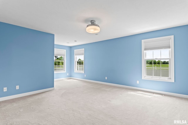 401 Cherry Cir, Williamsville, IL 62693 - carpeted spare room featuring baseboards