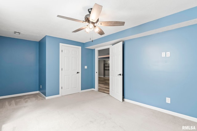 401 Cherry Cir, Williamsville, IL 62693 - unfurnished bedroom featuring carpet and ceiling fan