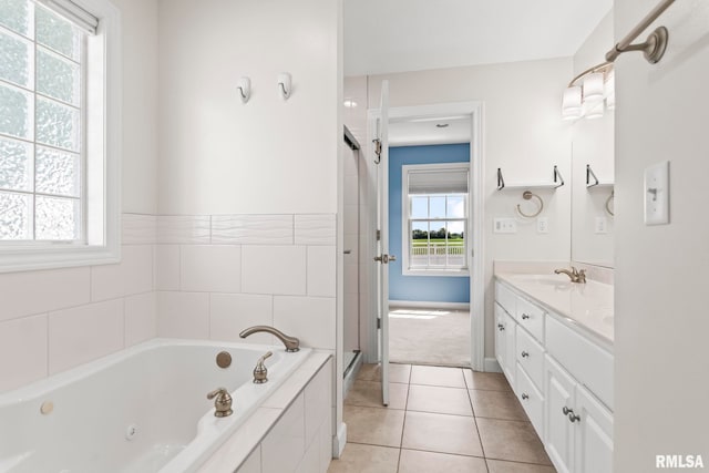 401 Cherry Cir, Williamsville, IL 62693 - full bathroom with a whirlpool tub, double vanity, a stall shower, and tile patterned flooring