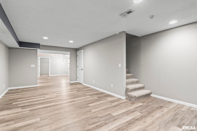 401 Cherry Cir, Williamsville, IL 62693 - finished below grade area featuring light wood-style floors, recessed lighting, and stairs