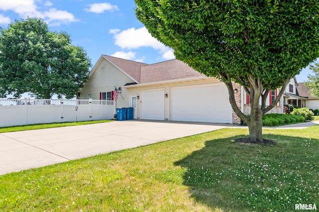 401 Cherry Cir, Williamsville, IL 62693 - view of home's exterior with an attached garage, concrete driveway, and a shingled roof