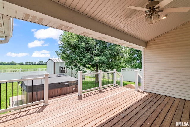 401 Cherry Cir, Williamsville, IL 62693 - wooden terrace with a hot tub, a ceiling fan, a fenced backyard, and a storage unit