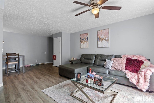 2900 Taylor Ave Unit 2, Springfield, IL 62703 - living area featuring wood finished floors, ceiling fan, and a textured ceiling