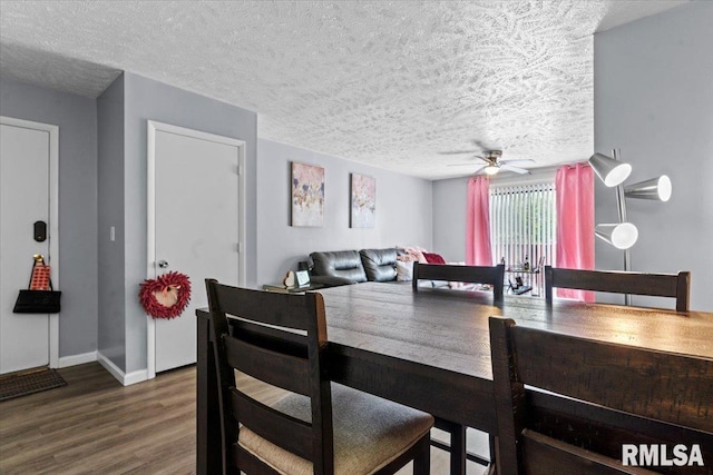 2900 Taylor Ave Unit 2, Springfield, IL 62703 - dining area with wood finished floors, a ceiling fan, and a textured ceiling