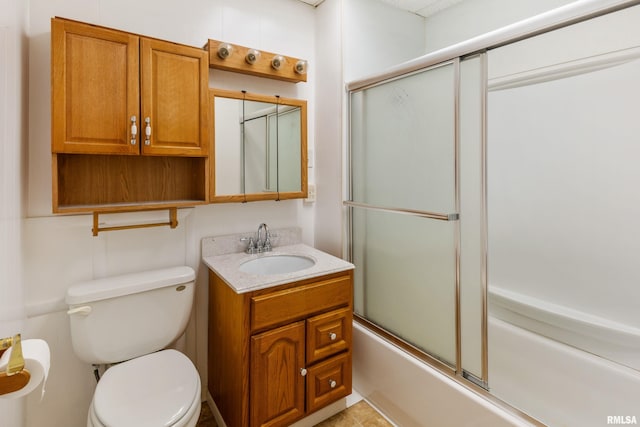 925 Payson Ave, Quincy, IL 62301 - bathroom featuring vanity and bath / shower combo with glass door