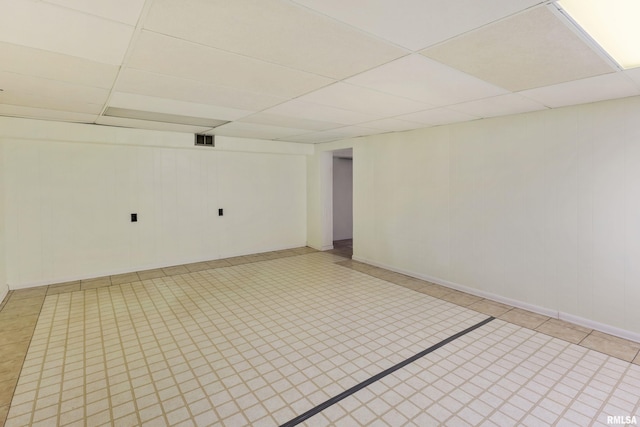 925 Payson Ave, Quincy, IL 62301 - spare room with a drop ceiling and light tile patterned floors