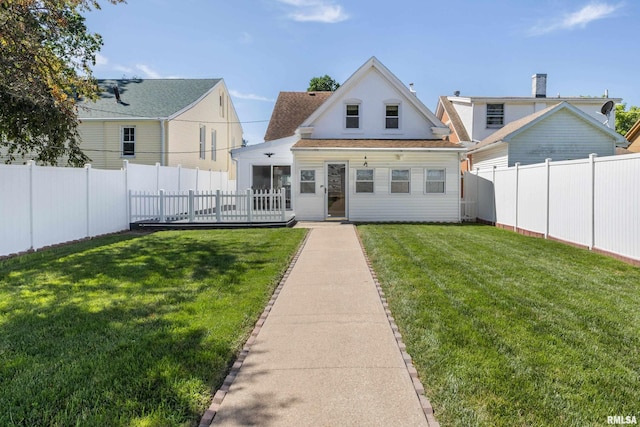 925 Payson Ave, Quincy, IL 62301 - rear view of property featuring a fenced backyard and a sunroom