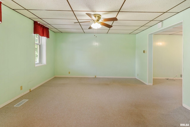 925 Payson Ave, Quincy, IL 62301 - unfurnished room with a drop ceiling, a ceiling fan, and carpet flooring