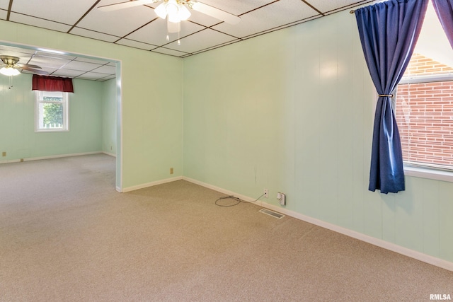 925 Payson Ave, Quincy, IL 62301 - unfurnished room featuring ceiling fan, carpet, and a drop ceiling