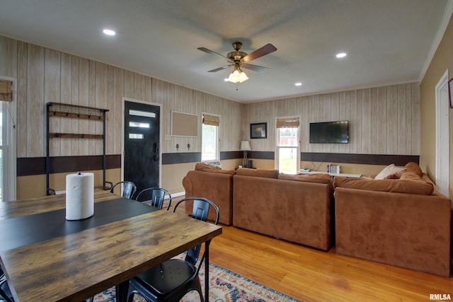 1940 Mulholland St, Nauvoo, IL 62354 - living area featuring a ceiling fan, wood finished floors, wallpapered walls, and recessed lighting