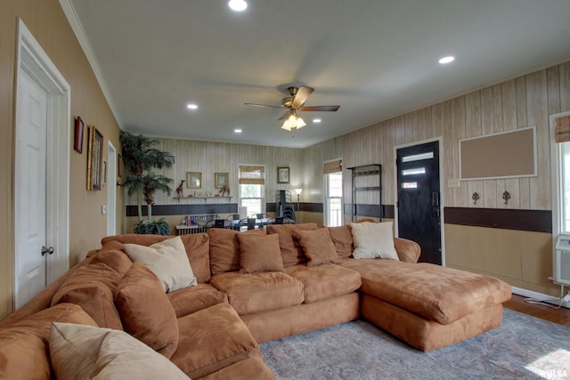 1940 Mulholland St, Nauvoo, IL 62354 - living area with a ceiling fan, recessed lighting, wood finished floors, crown molding, and wallpapered walls
