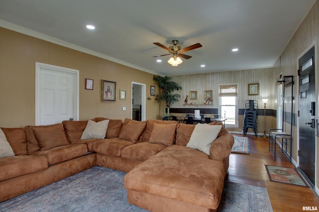1940 Mulholland St, Nauvoo, IL 62354 - living room featuring a ceiling fan, recessed lighting, ornamental molding, and wood finished floors