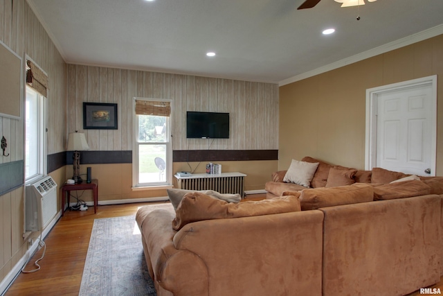 1940 Mulholland St, Nauvoo, IL 62354 - living room with ornamental molding, wood finished floors, a ceiling fan, and recessed lighting