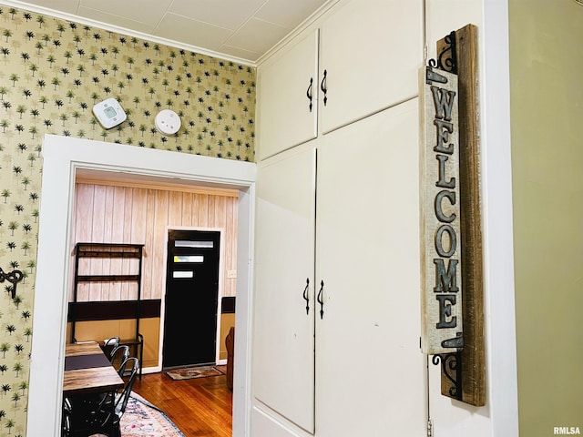 1940 Mulholland St, Nauvoo, IL 62354 - interior space featuring wallpapered walls, crown molding, wood finished floors, and an office area