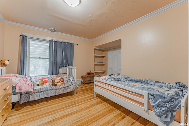 114 N Spring St, Mount Pulaski, IL 62548 - bedroom featuring light wood-type flooring and ornamental molding