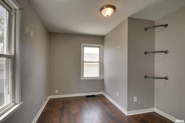 1421 N 13th St, Quincy, IL 62301 - spare room with wood finished floors and baseboards