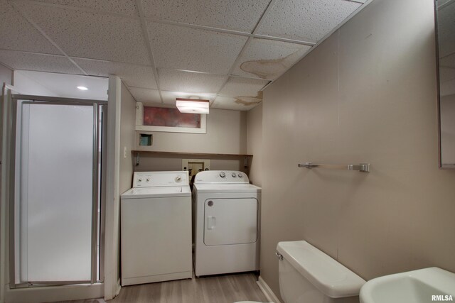 1421 N 13th St, Quincy, IL 62301 - washroom featuring separate washer and dryer and light wood-style floors