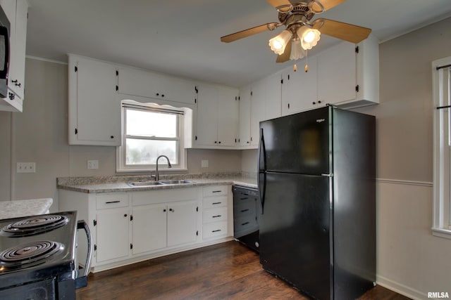 1421 N 13th St, Quincy, IL 62301 - kitchen with black appliances, ceiling fan, dark wood-type flooring, white cabinetry, and light countertops