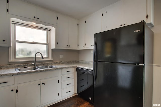 1421 N 13th St, Quincy, IL 62301 - kitchen with black appliances and white cabinetry