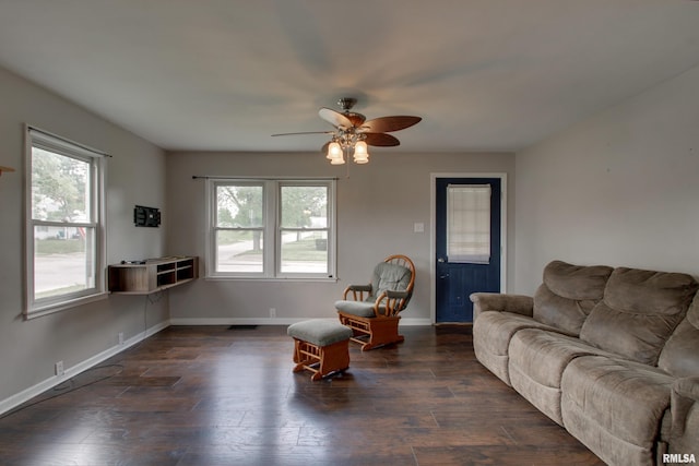 1421 N 13th St, Quincy, IL 62301 - living room with ceiling fan and dark wood-style flooring