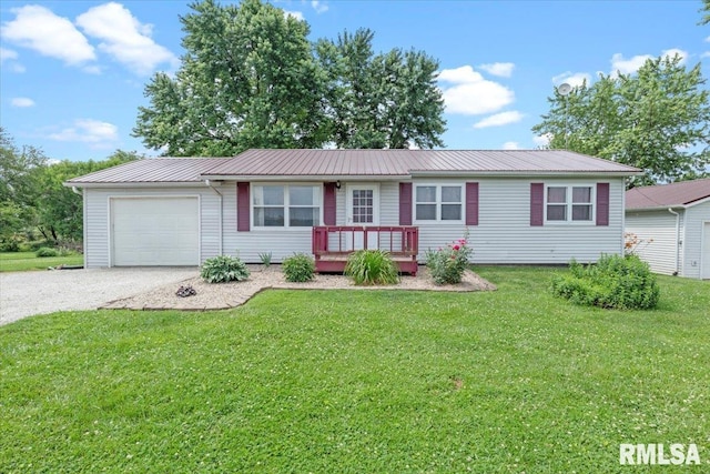 19581 Finney Rd, Girard, IL 62640 - ranch-style house featuring an attached garage, a metal roof, a front yard, and a wooden deck