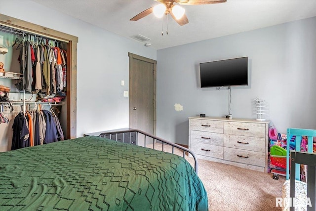 19581 Finney Rd, Girard, IL 62640 - bedroom with carpet floors, a closet, and ceiling fan