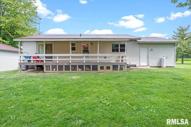 19581 Finney Rd, Girard, IL 62640 - back of house with a metal roof and a yard