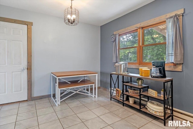 19581 Finney Rd, Girard, IL 62640 - dining space featuring light tile patterned floors and a chandelier