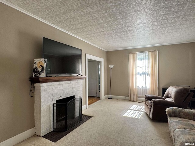 814 N Prairie St, Galesburg, IL 61401 - carpeted living room featuring crown molding and a brick fireplace