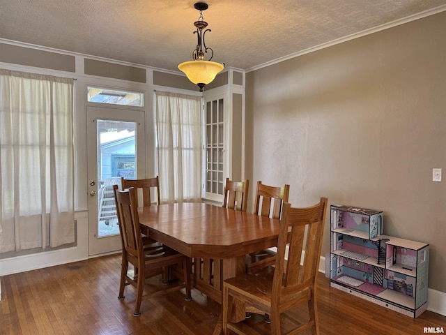 814 N Prairie St, Galesburg, IL 61401 - dining room with hardwood / wood-style flooring and ornamental molding