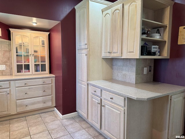 814 N Prairie St, Galesburg, IL 61401 - kitchen with tasteful backsplash, light tile patterned floors, and open shelves