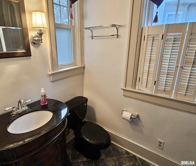 814 N Prairie St, Galesburg, IL 61401 - half bath featuring plenty of natural light and vanity