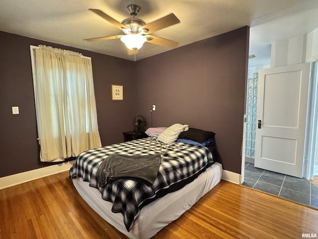814 N Prairie St, Galesburg, IL 61401 - bedroom with wood finished floors and ceiling fan