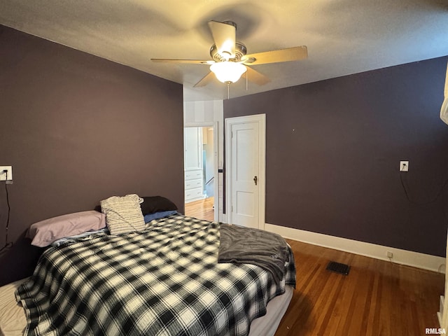 814 N Prairie St, Galesburg, IL 61401 - bedroom featuring wood finished floors and ceiling fan
