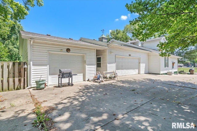 603 W Jefferson St, Auburn, IL 62615 - view of front of property with driveway and an attached garage