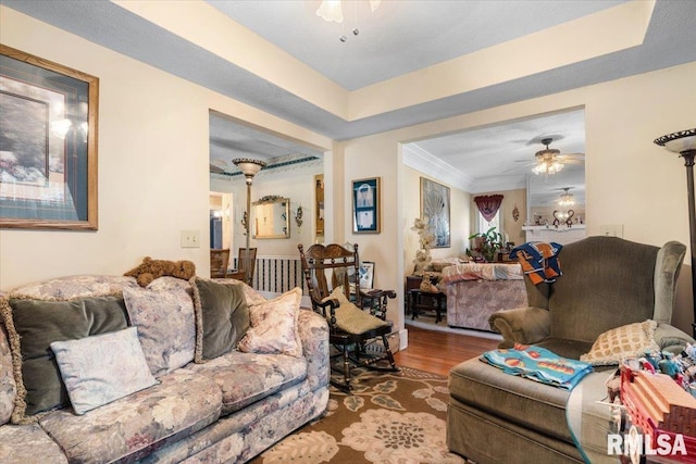 603 W Jefferson St, Auburn, IL 62615 - living area featuring a ceiling fan, wood finished floors, and crown molding