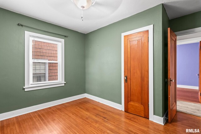 2535 S 8th St, Springfield, IL 62703 - spare room featuring wood finished floors and ceiling fan