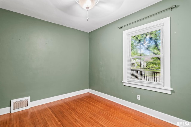 2535 S 8th St, Springfield, IL 62703 - unfurnished room featuring wood finished floors and ceiling fan