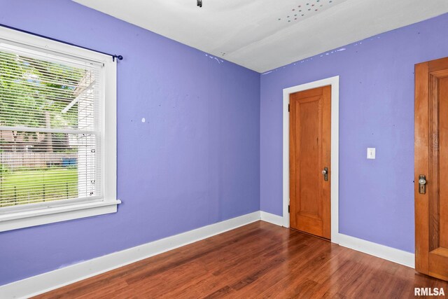 2535 S 8th St, Springfield, IL 62703 - empty room with healthy amount of natural light and wood finished floors