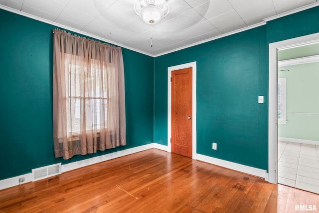 2535 S 8th St, Springfield, IL 62703 - unfurnished room with ornamental molding and wood finished floors