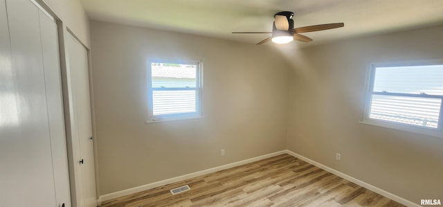 2217 Ramsey Ave, Springfield, IL 62702 - unfurnished bedroom featuring light wood-type flooring and ceiling fan