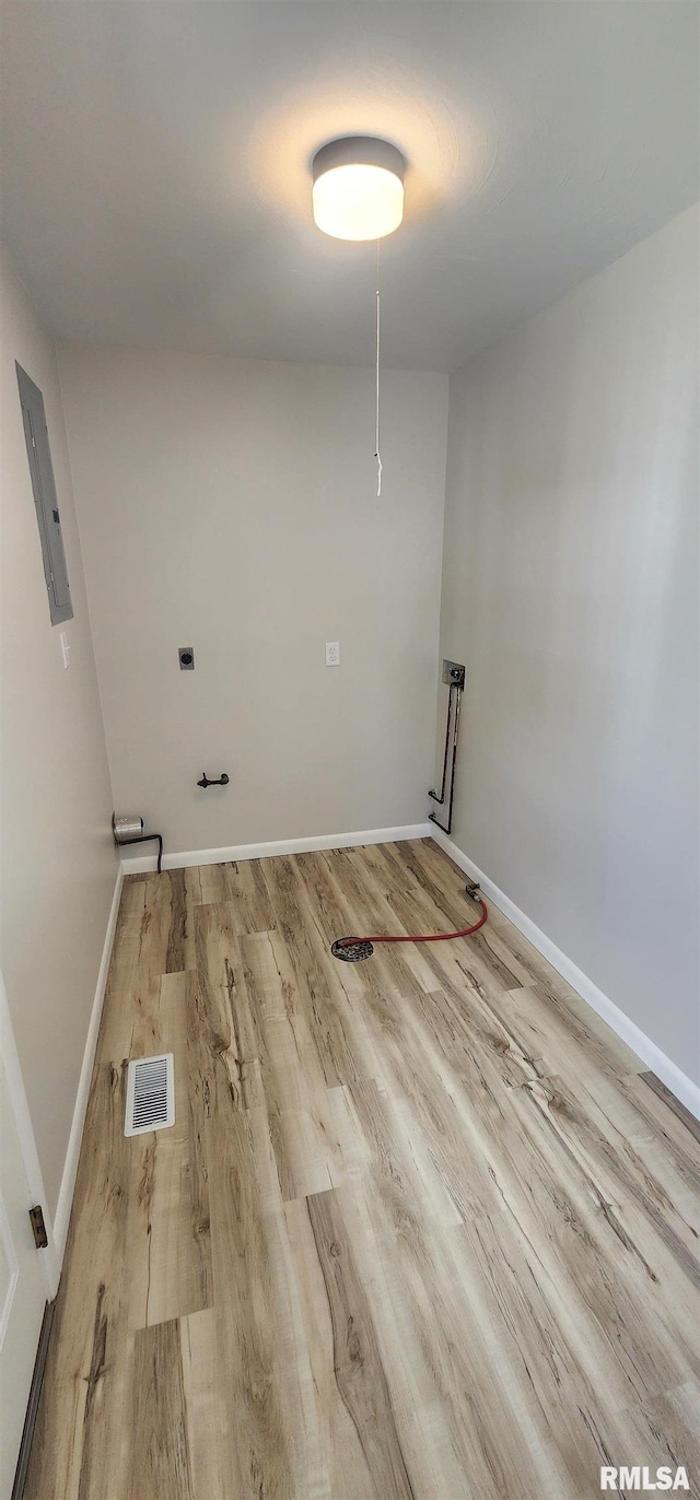 2217 Ramsey Ave, Springfield, IL 62702 - washroom with electric panel and wood finished floors