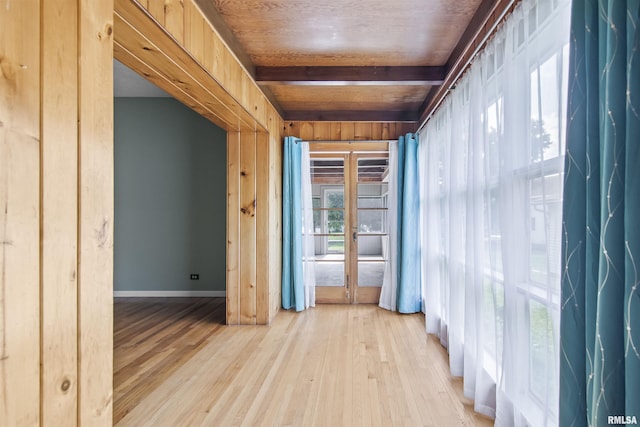 508 N Washington St, Mount Pulaski, IL 62548 - unfurnished room with light wood finished floors and beam ceiling