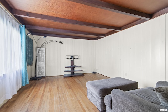 508 N Washington St, Mount Pulaski, IL 62548 - living area with beamed ceiling, hardwood / wood-style flooring, and wooden walls