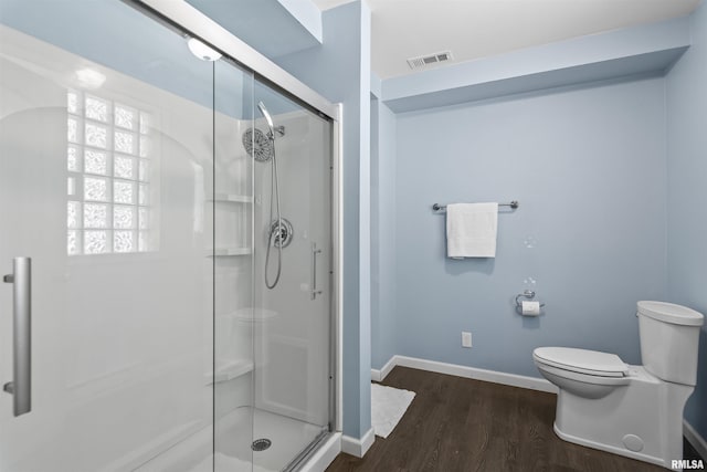 508 N Washington St, Mount Pulaski, IL 62548 - full bath with a shower stall and wood finished floors
