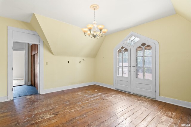 508 N Washington St, Mount Pulaski, IL 62548 - bonus room with wood-type flooring, lofted ceiling, and a chandelier