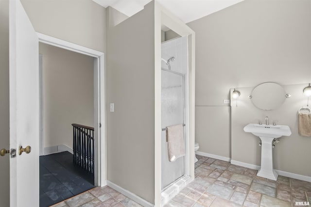 508 N Washington St, Mount Pulaski, IL 62548 - bathroom featuring stone finish floors and a shower stall